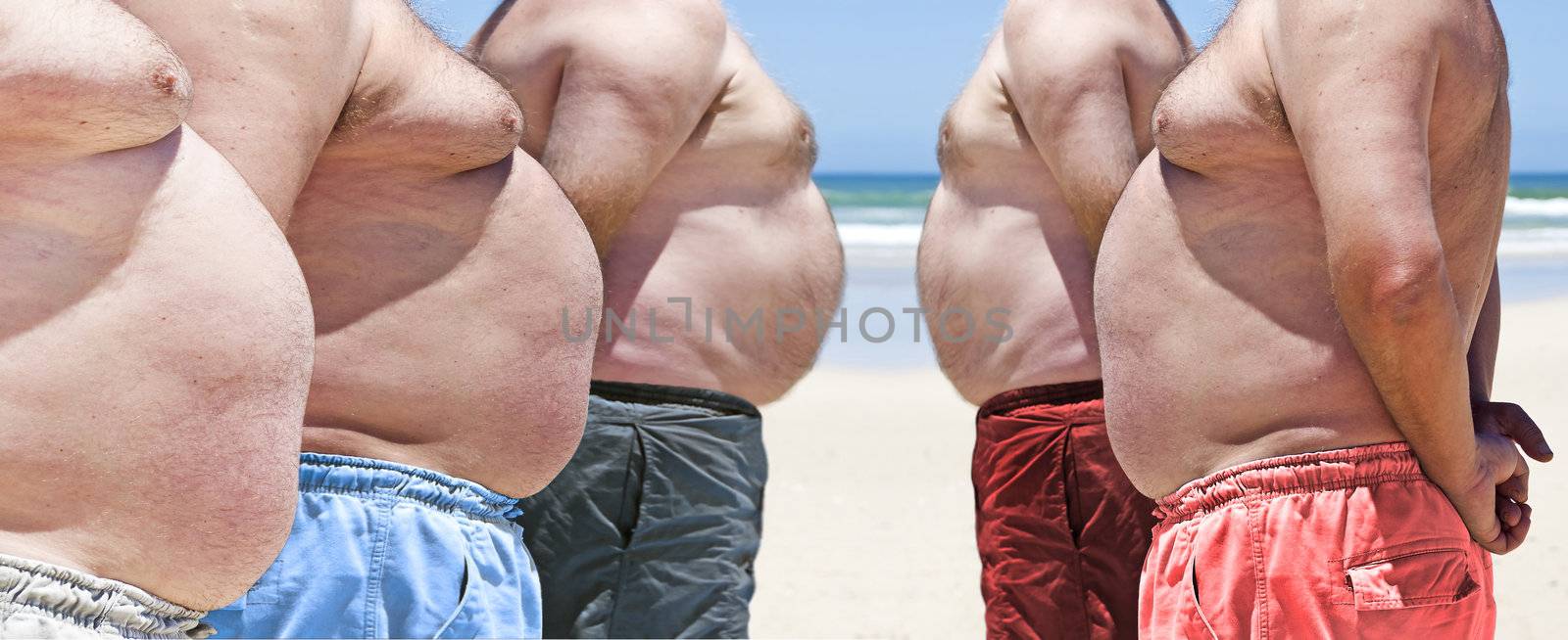 Five obesely fat men on the beach