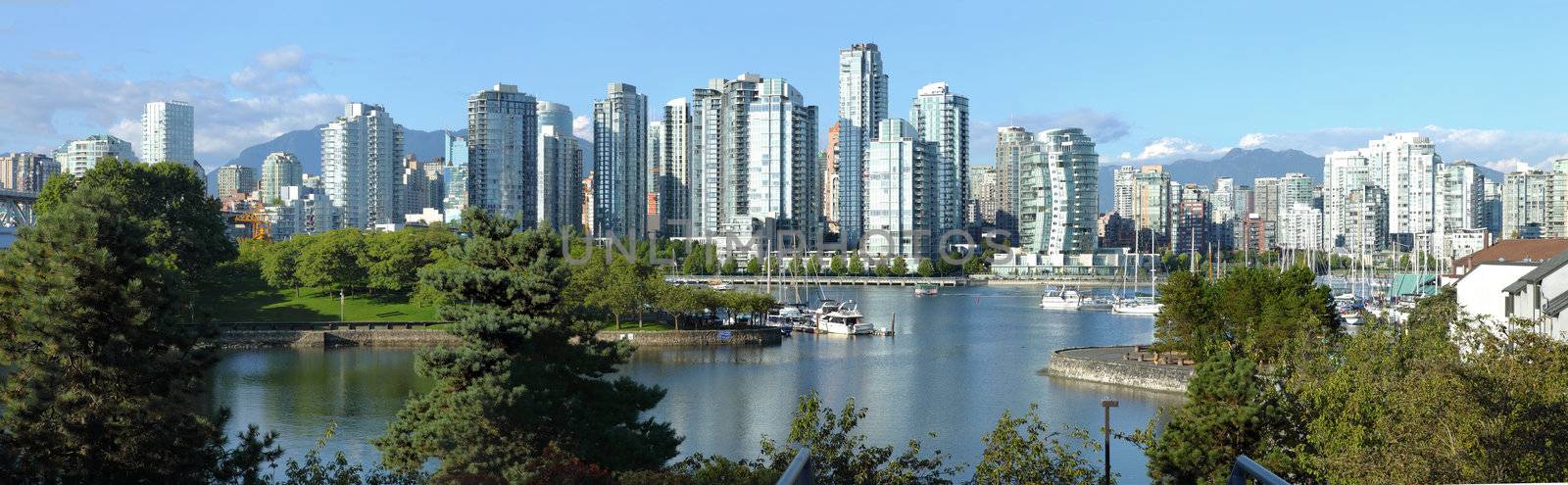 Vancouver BC skyline at False creek. by Rigucci