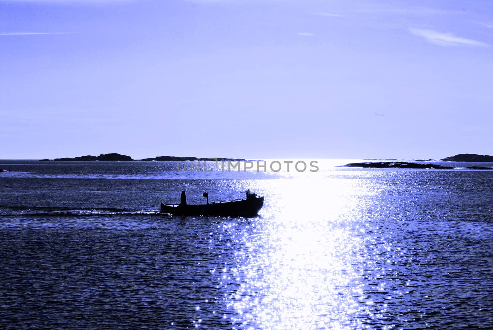 A fishing boat in sunset.