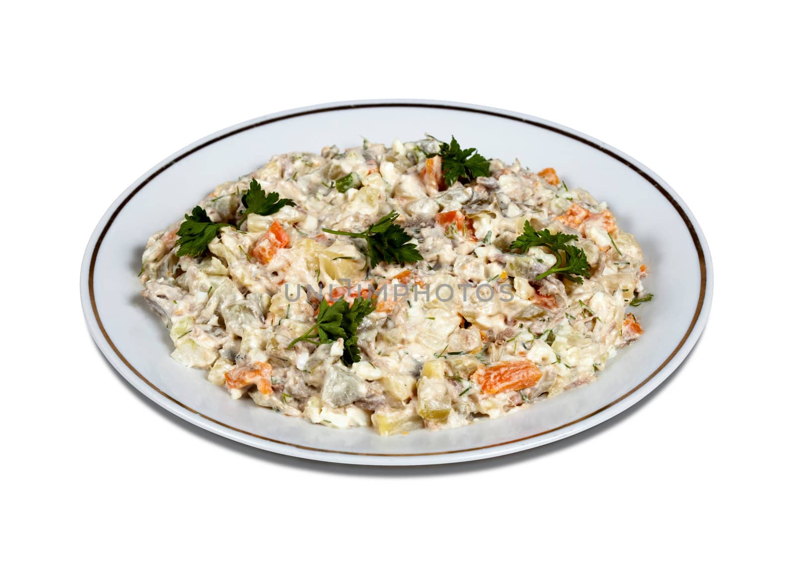 Olivier salad on a plate. Isolated on white with clipping path
