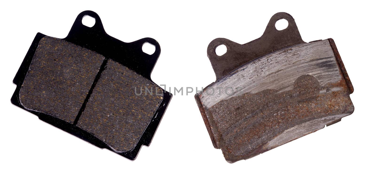 New and worn brake pad, isolated on background