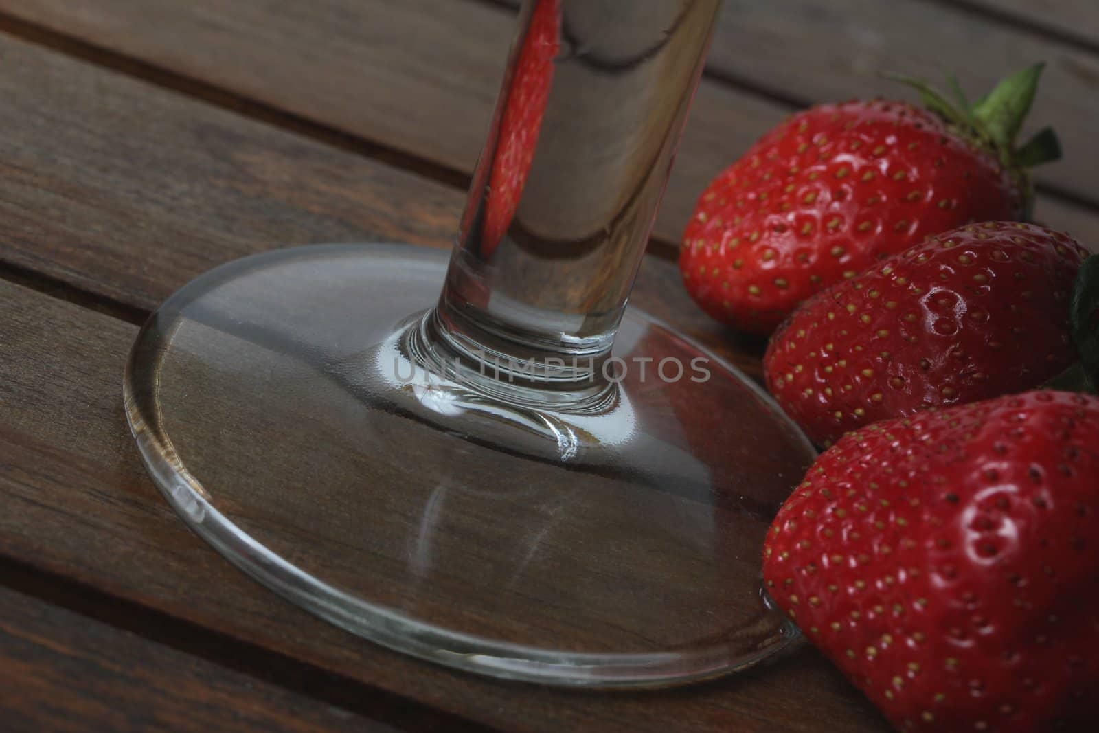 glass and strawberries