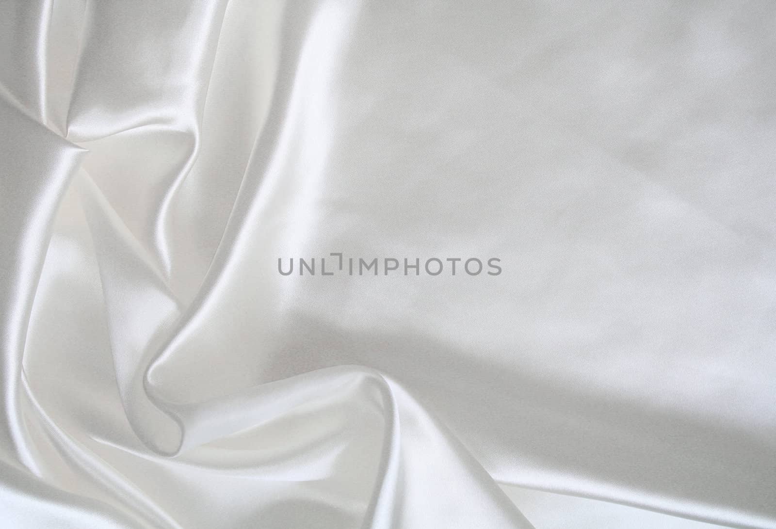 Smooth elegant white silk as wedding background