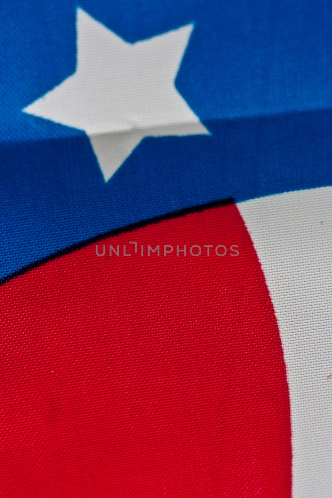 The star and stripes of the American Flag up close.
