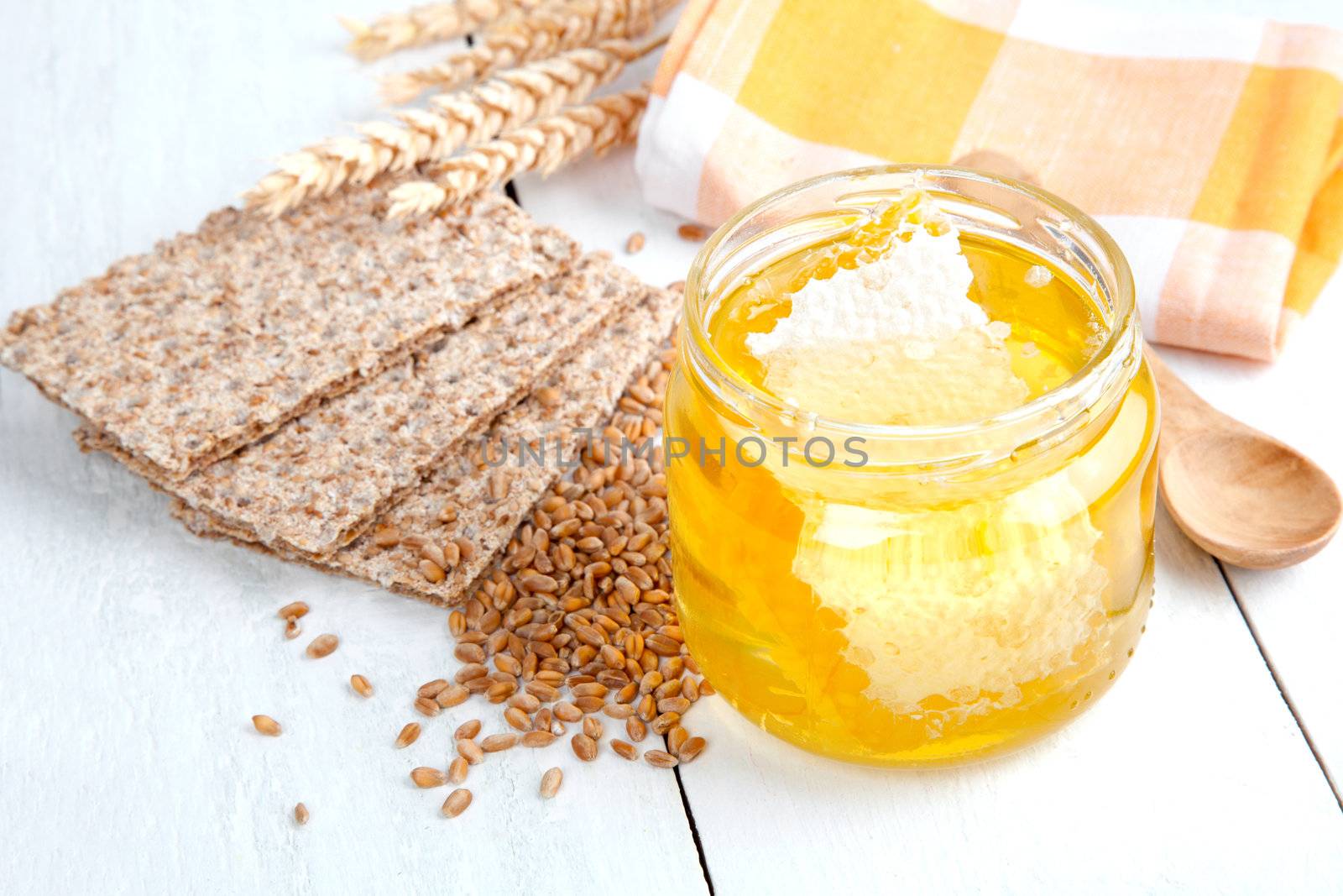 honey with crispbread and wheat grain