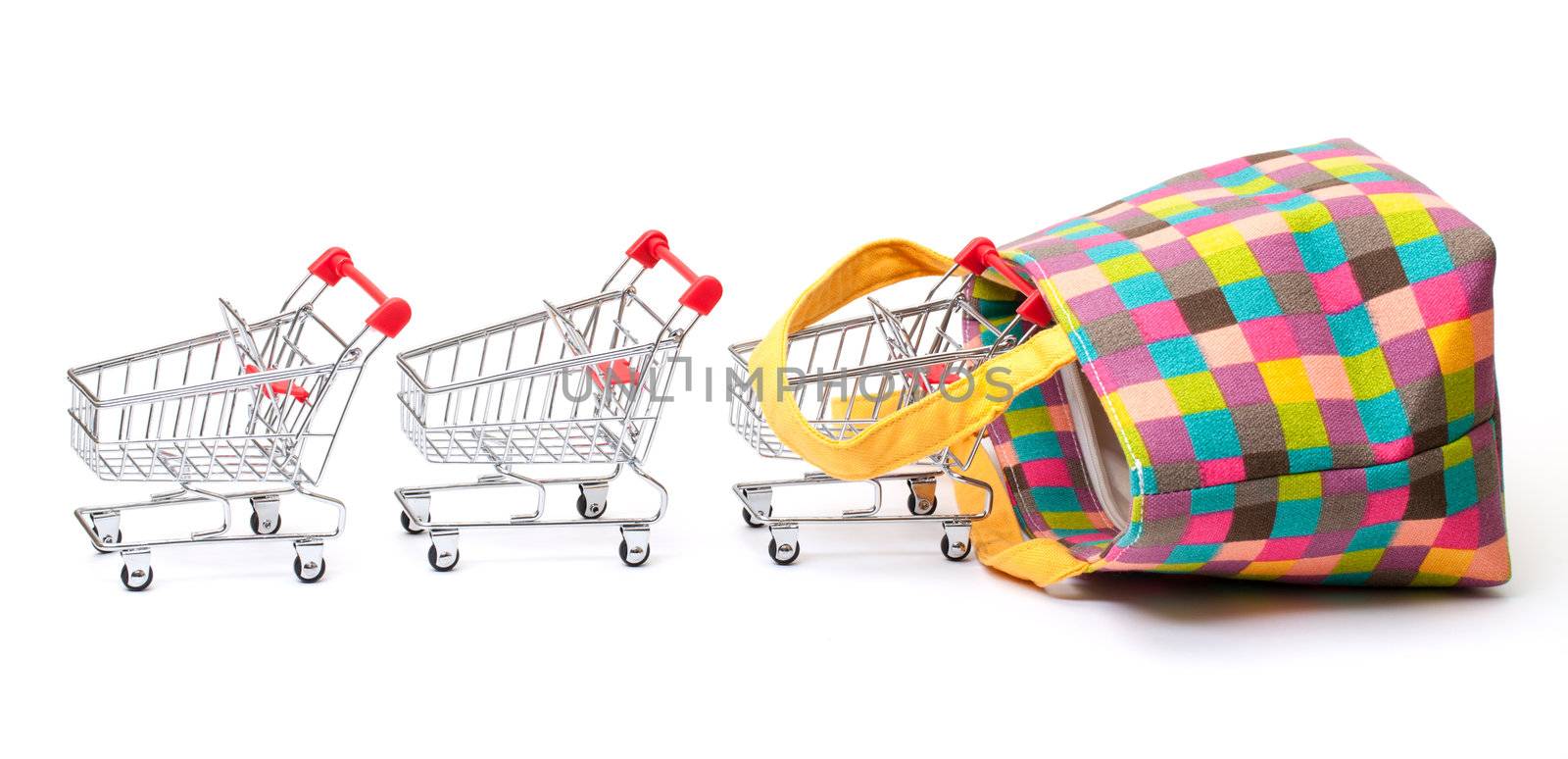 Shopping Cart with Vibrant Bag on white background