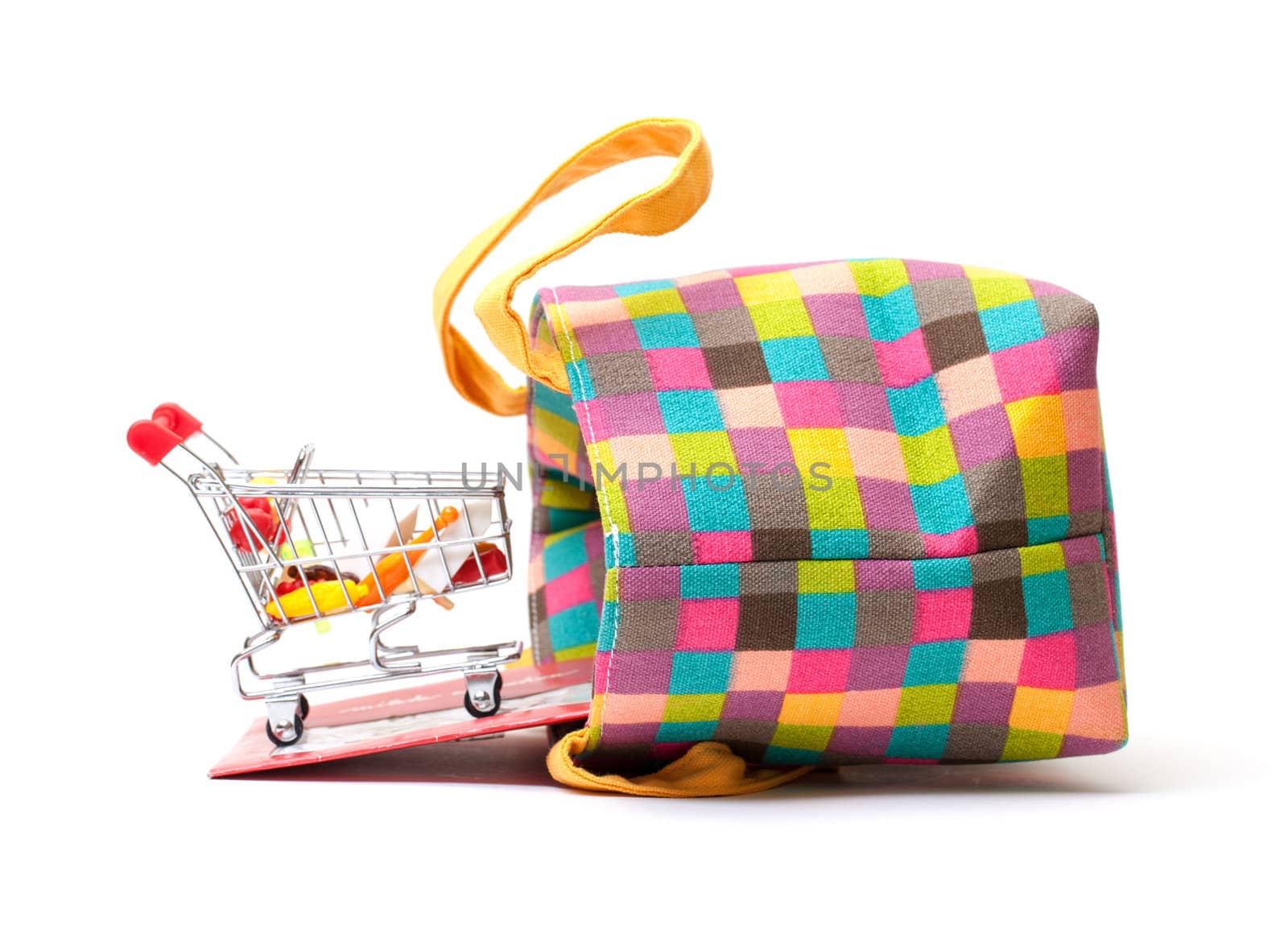 Shopping Cart with Vibrant Bag on white background