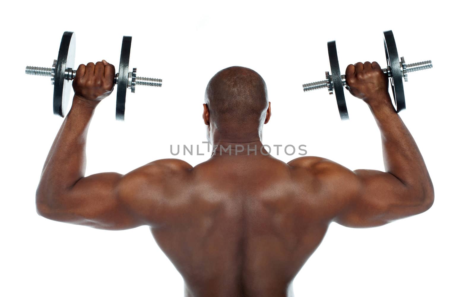 Rear view of a young male bodybuilder by stockyimages