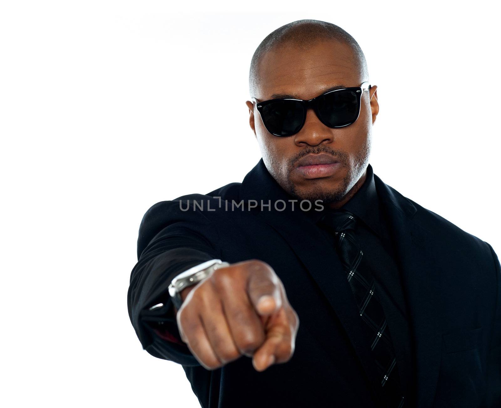 Powerful corporate businessperson pointing at you