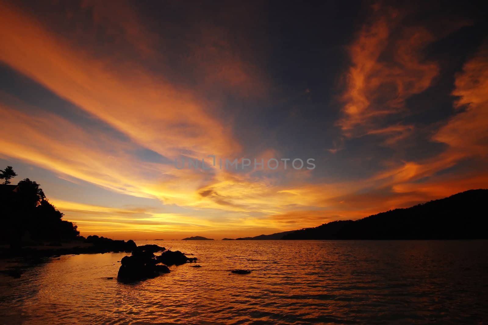 ripple sky in orange during sunset from a beach in Thailand