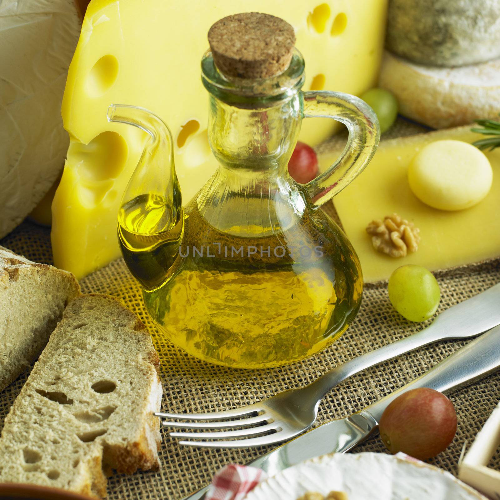 cheese still life with olive oil