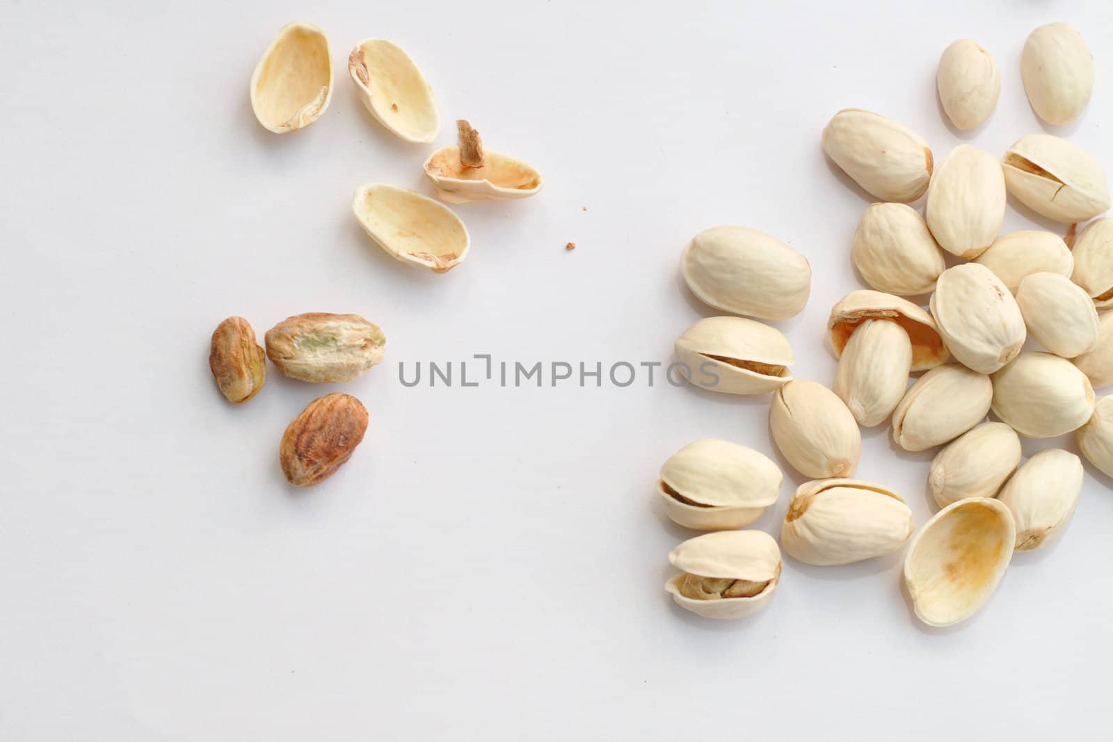 Pistachio nuts on isolated white background