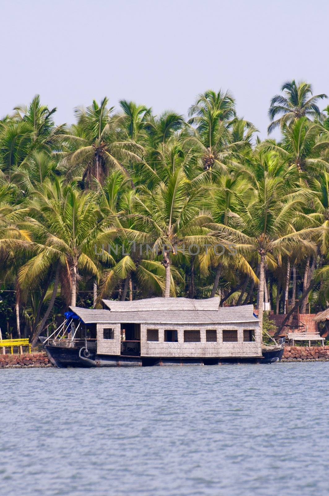 A parked houseboat on the backwaters of Kerala, India 