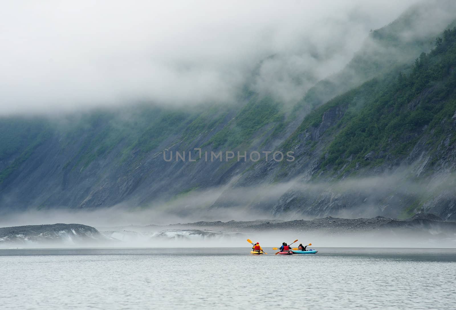 kayak in Valdez Glacier, Alaska with misty atmosphere