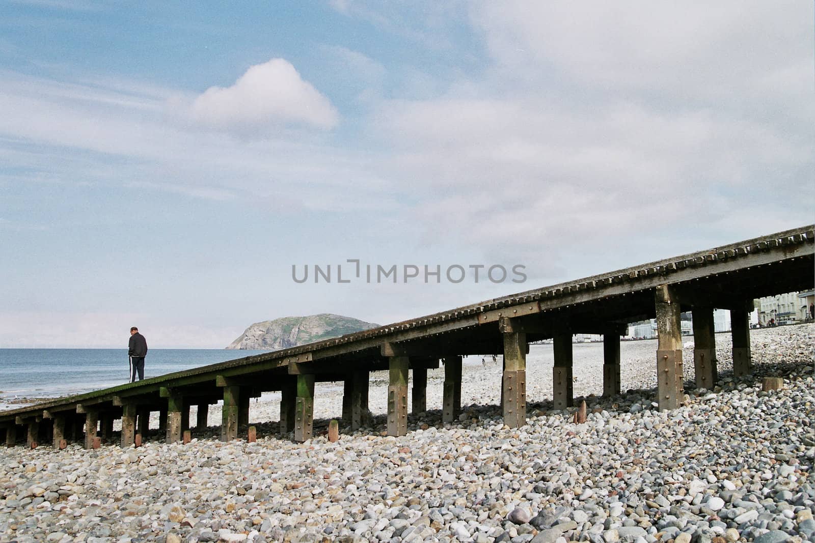 Man on slipway. by richsouthwales