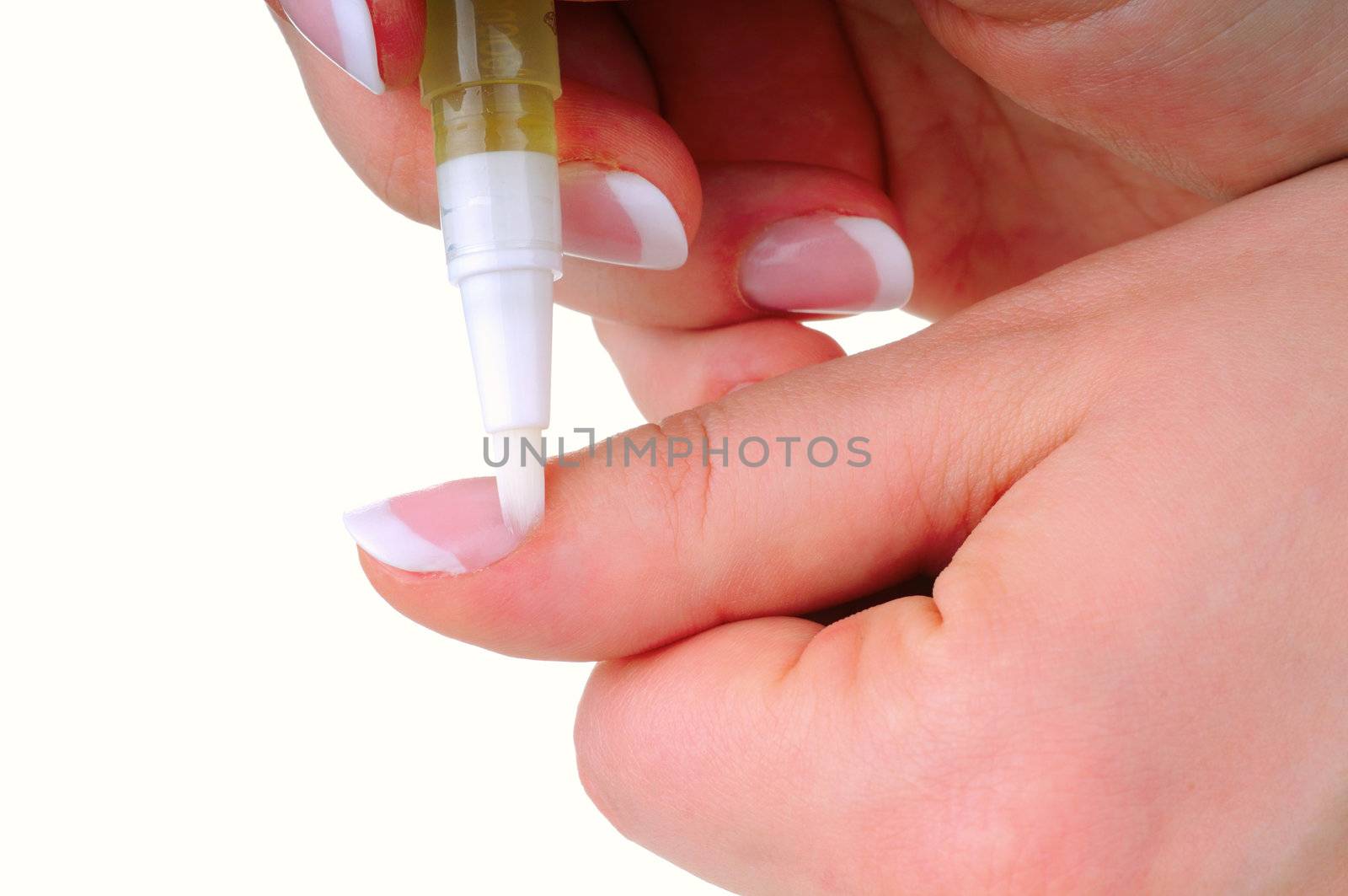 Oil applying on nail as a part of manicure