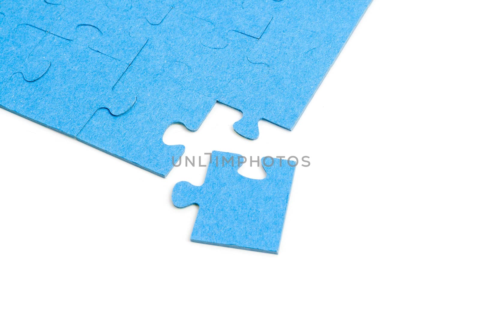 Blue Puzzle isolated on white background by Mazirama