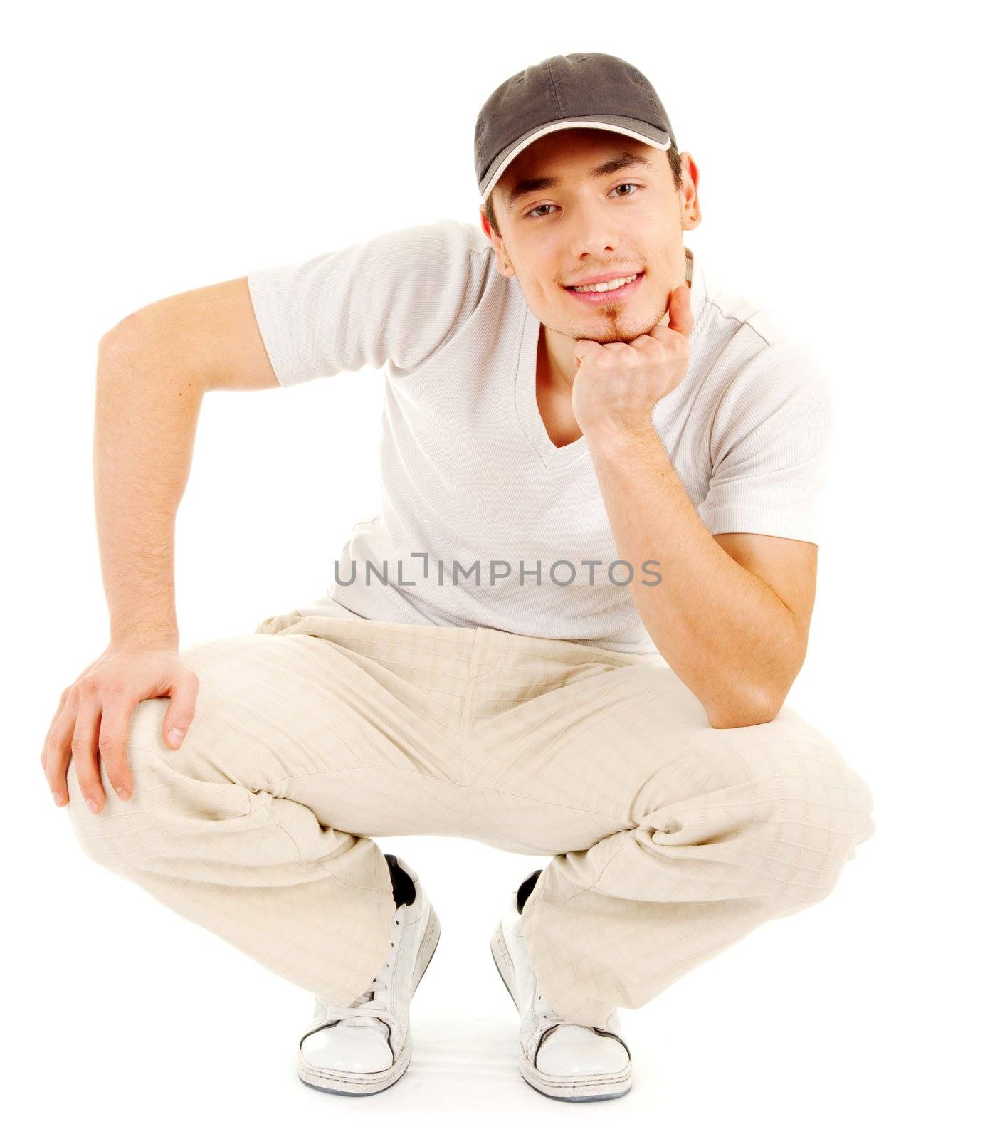 Smilling young man in a casual dress on white background
