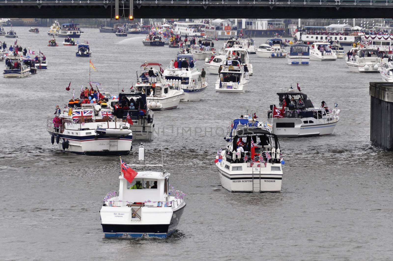 LONDON, UK, Sunday June 3, 2012. Hundred of boats muster on the river Thames in Putney (west London) for the Thames Diamond Jubilee Pageant to celebrate the Queen's Diamond Jubilee.