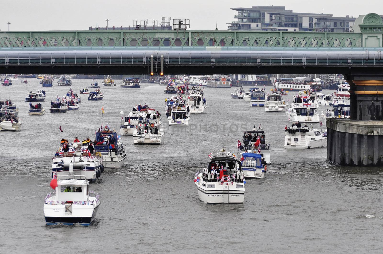 LONDON, UK, Sunday June 3, 2012. Hundred of boats muster on the river Thames in Putney (west London) for the Thames Diamond Jubilee Pageant to celebrate the Queen's Diamond Jubilee.