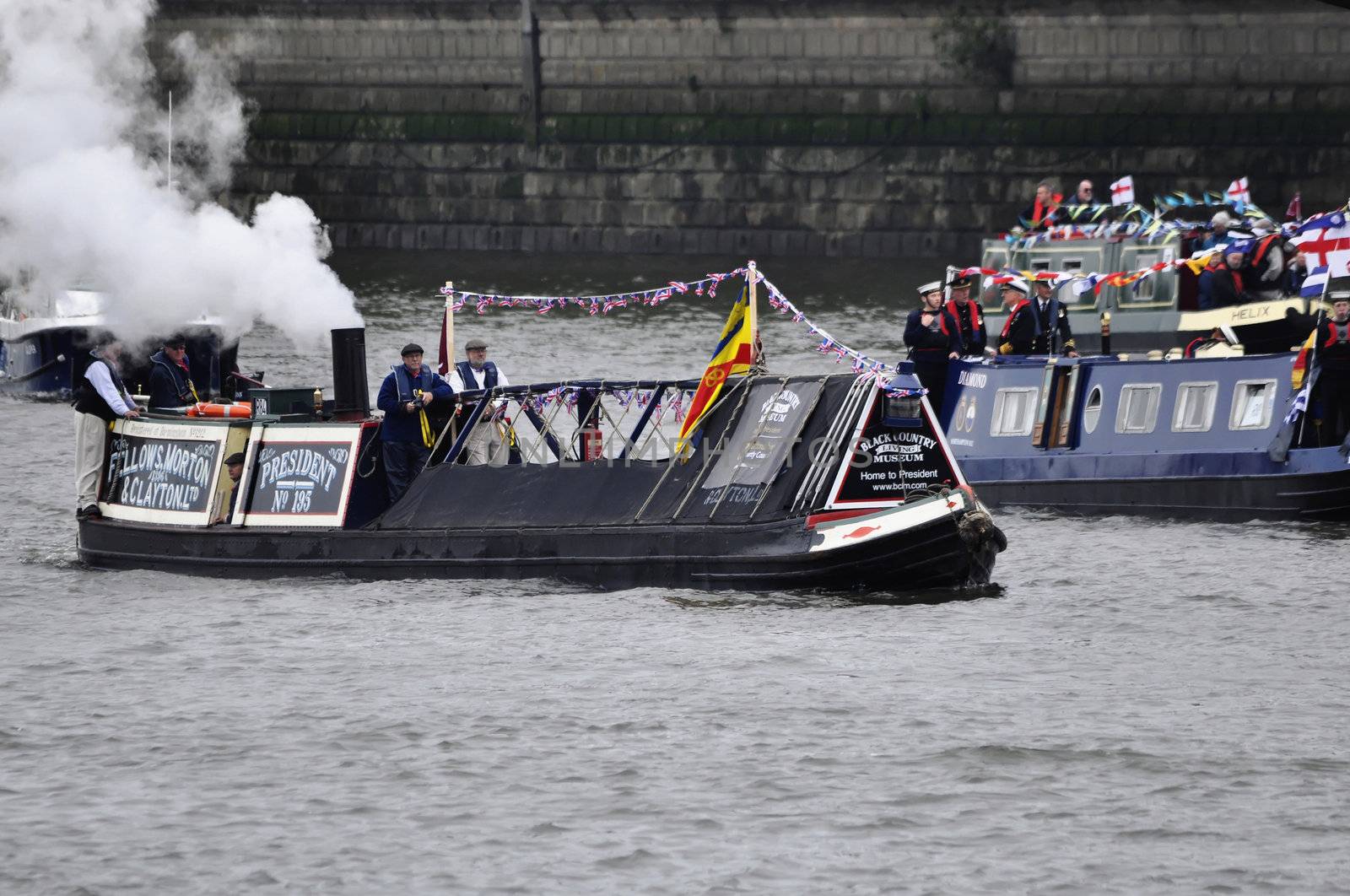 LONDON, UK, Sunday June 3, 2012. Hundred of boats muster on the river Thames in Putney (west London) for the Thames Diamond Jubilee Pageant to celebrate the Queen's Diamond Jubilee.