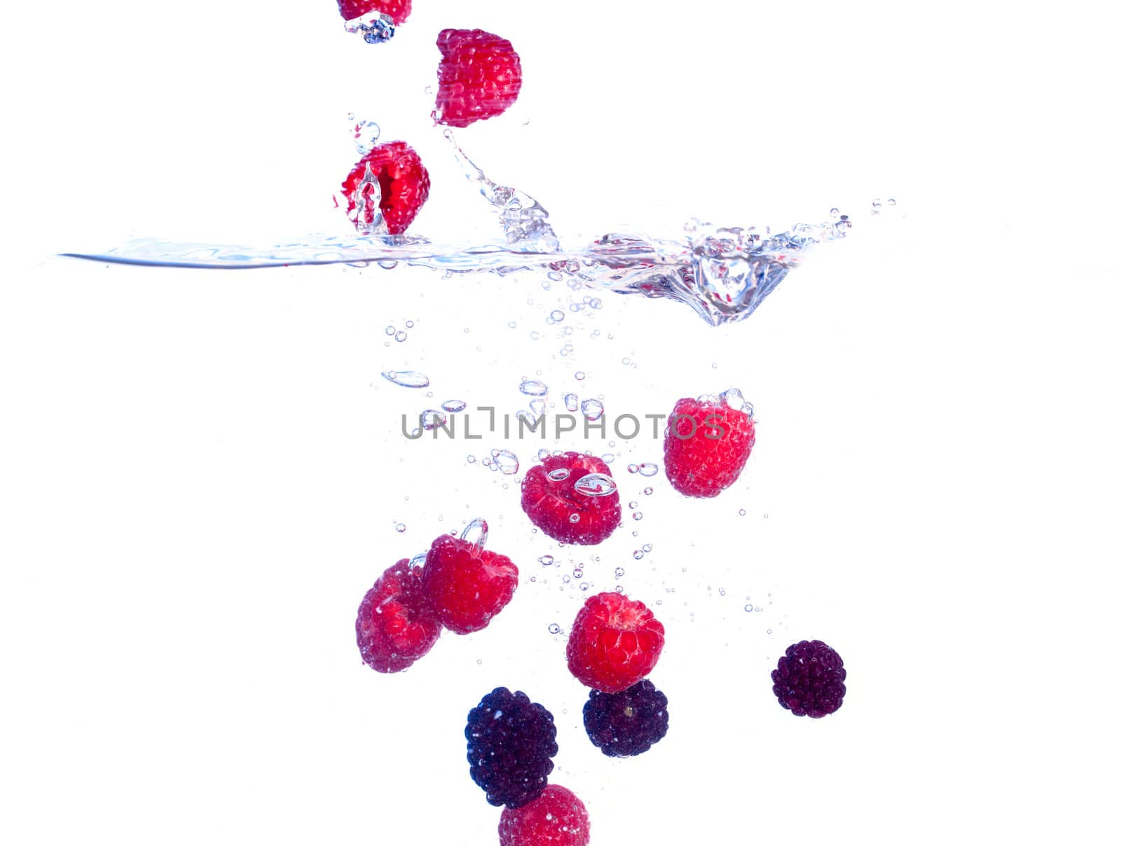 Berries Falls under Water with a Splash, isolated