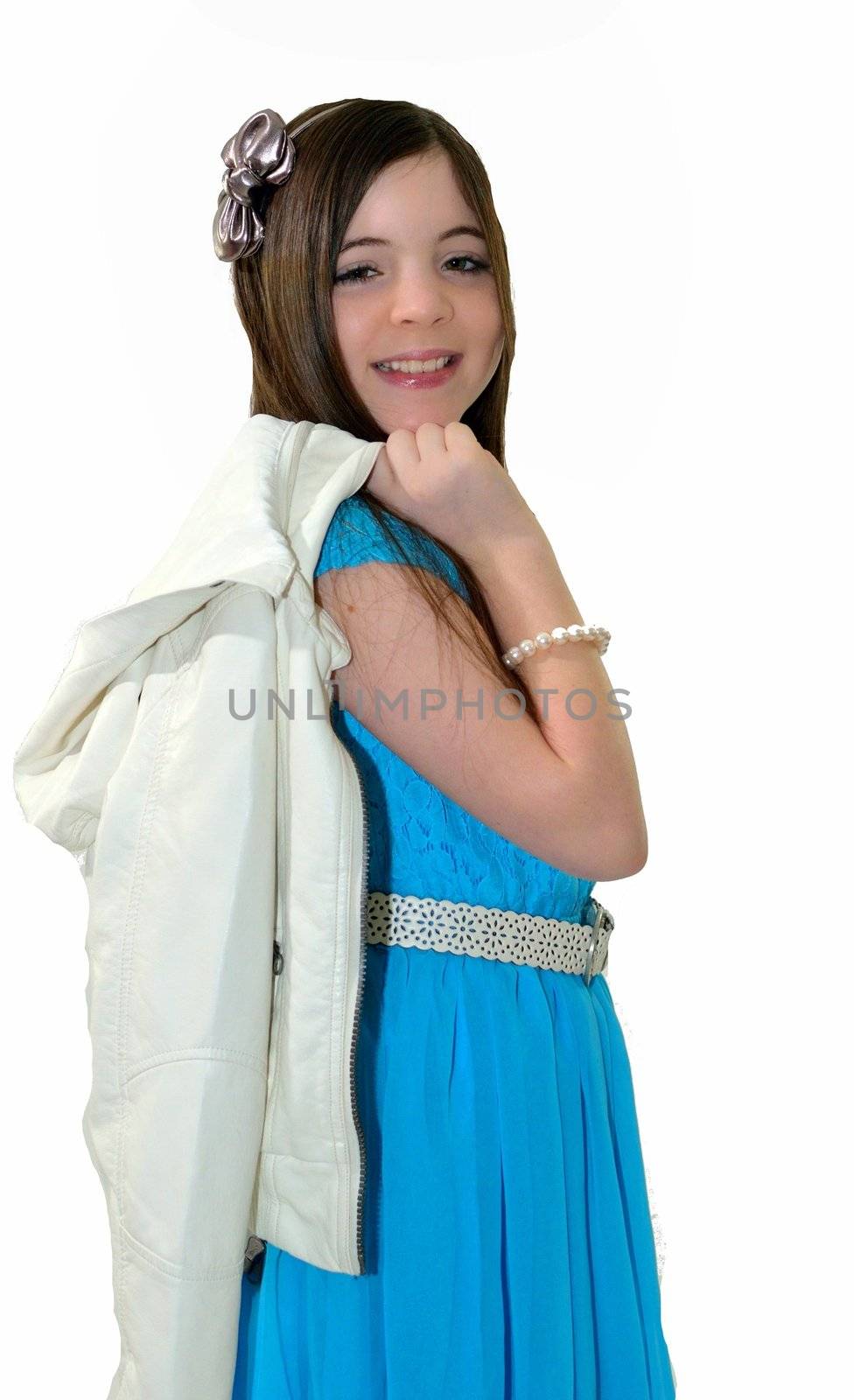 Ten year old girl with her jacket over her shoulder