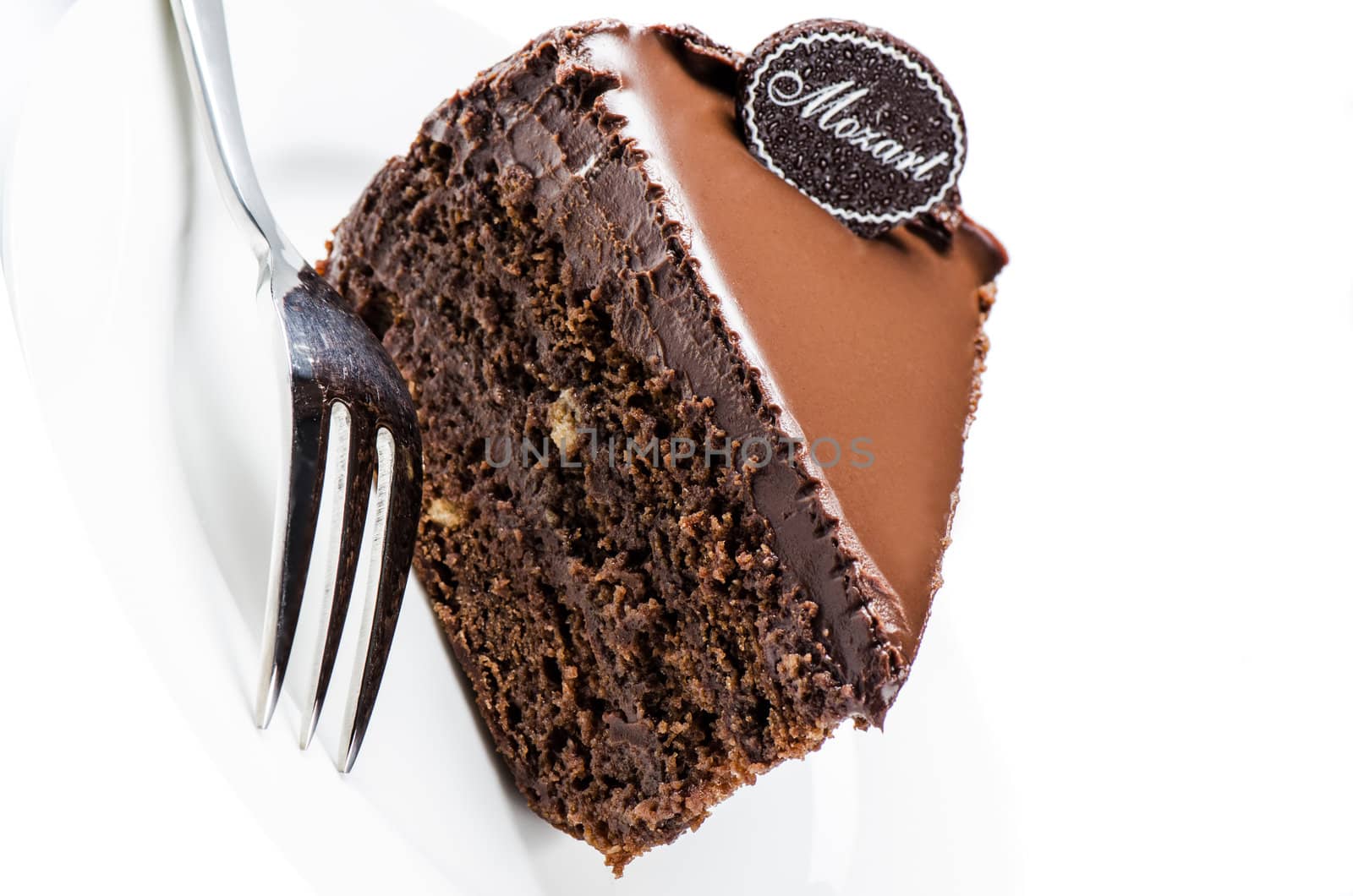 Piece of chocolate cake by Nanisimova
