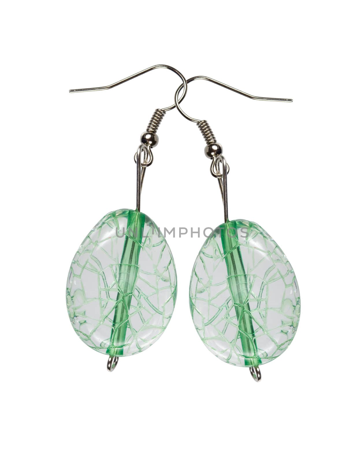 Earrings in transparent green glass on a white background. Collage