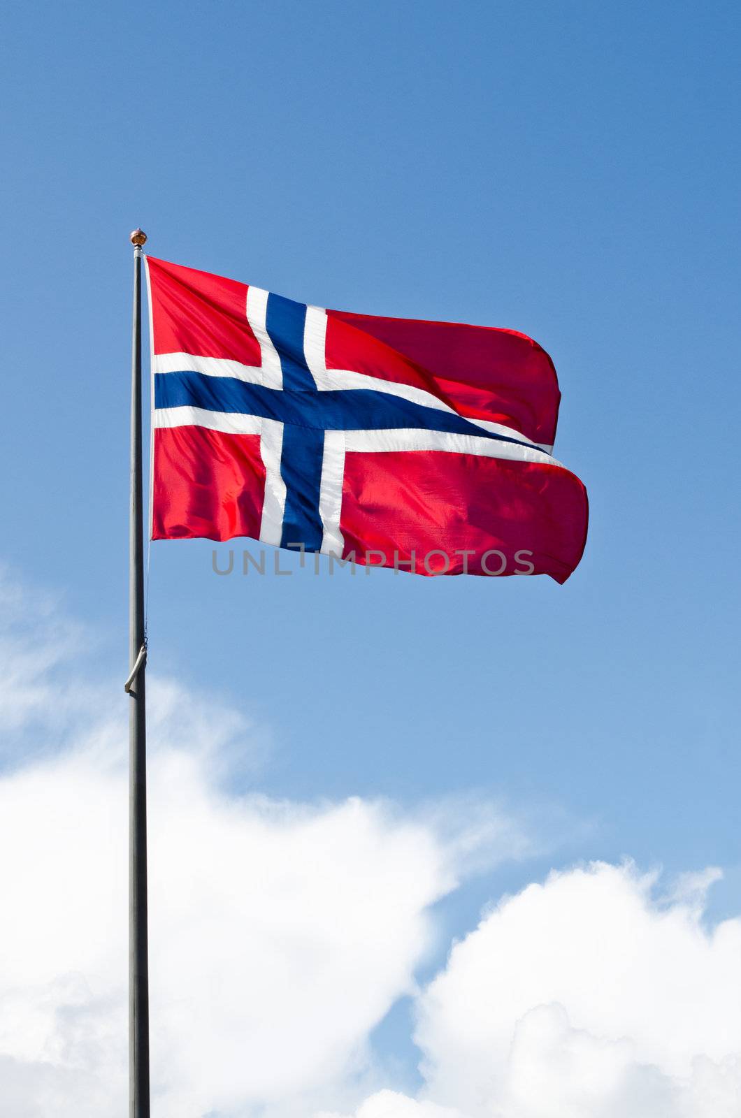 Norwegian flag on blue sky