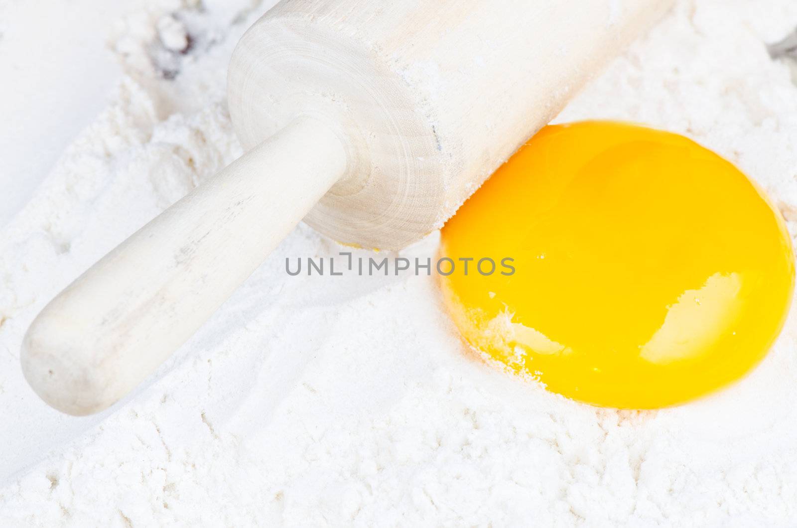 Press dough flour and yolk close up