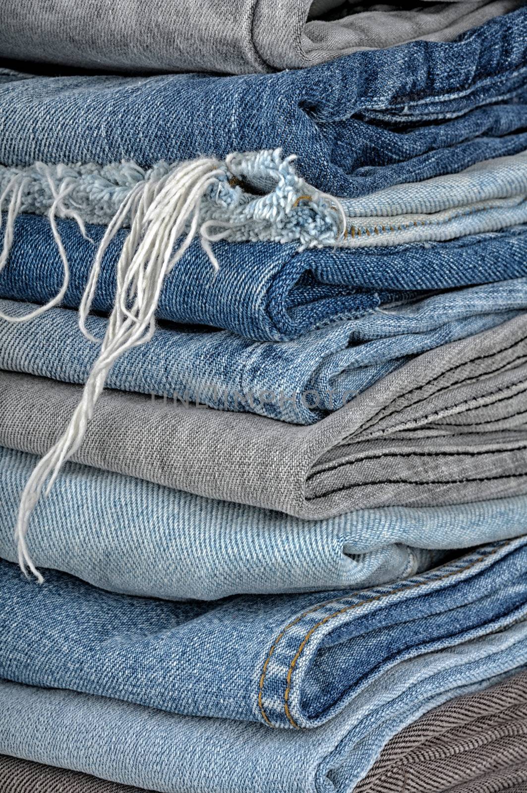 background of a stack of old jeans