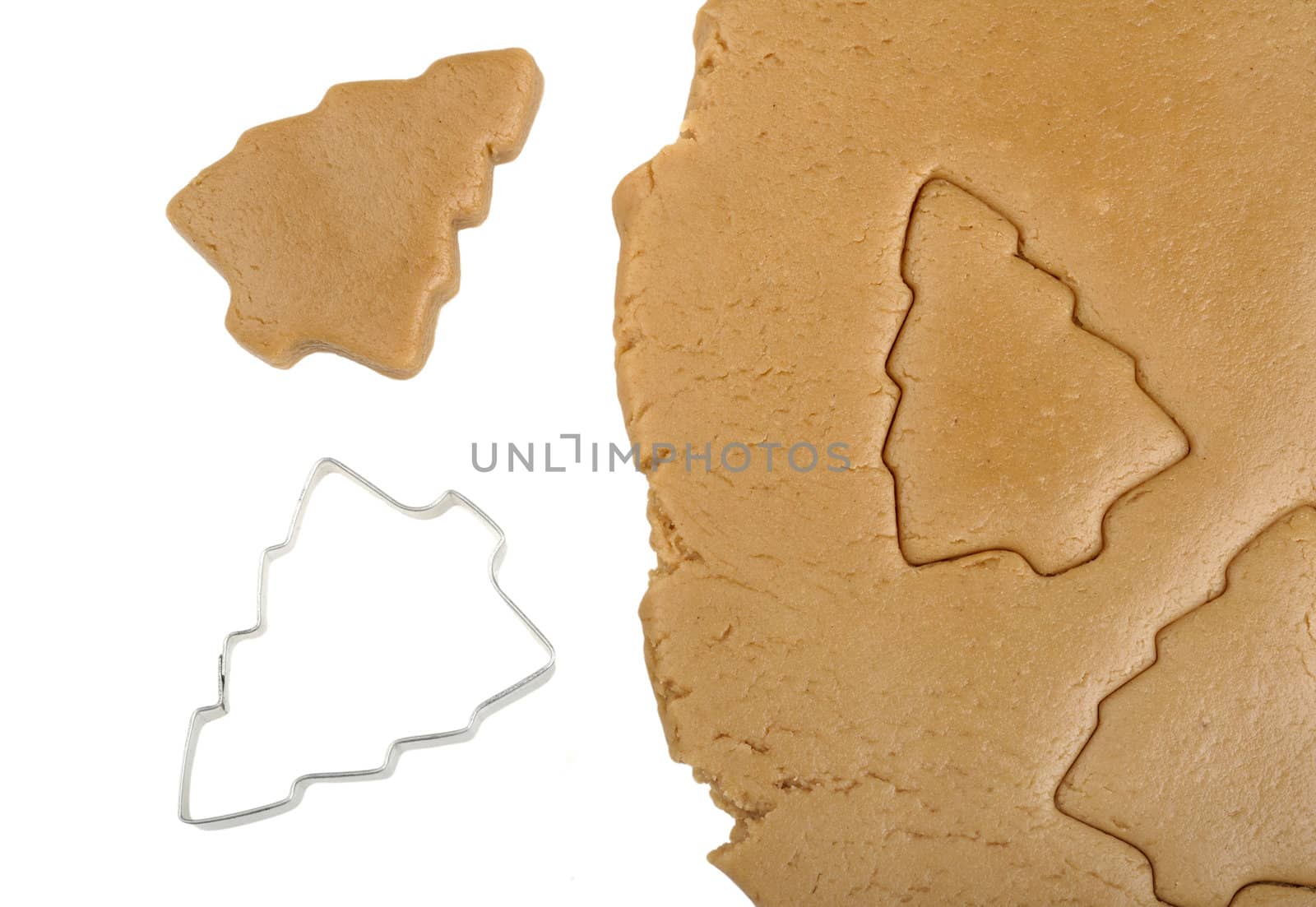 dough and cookie cutter isolated on white background