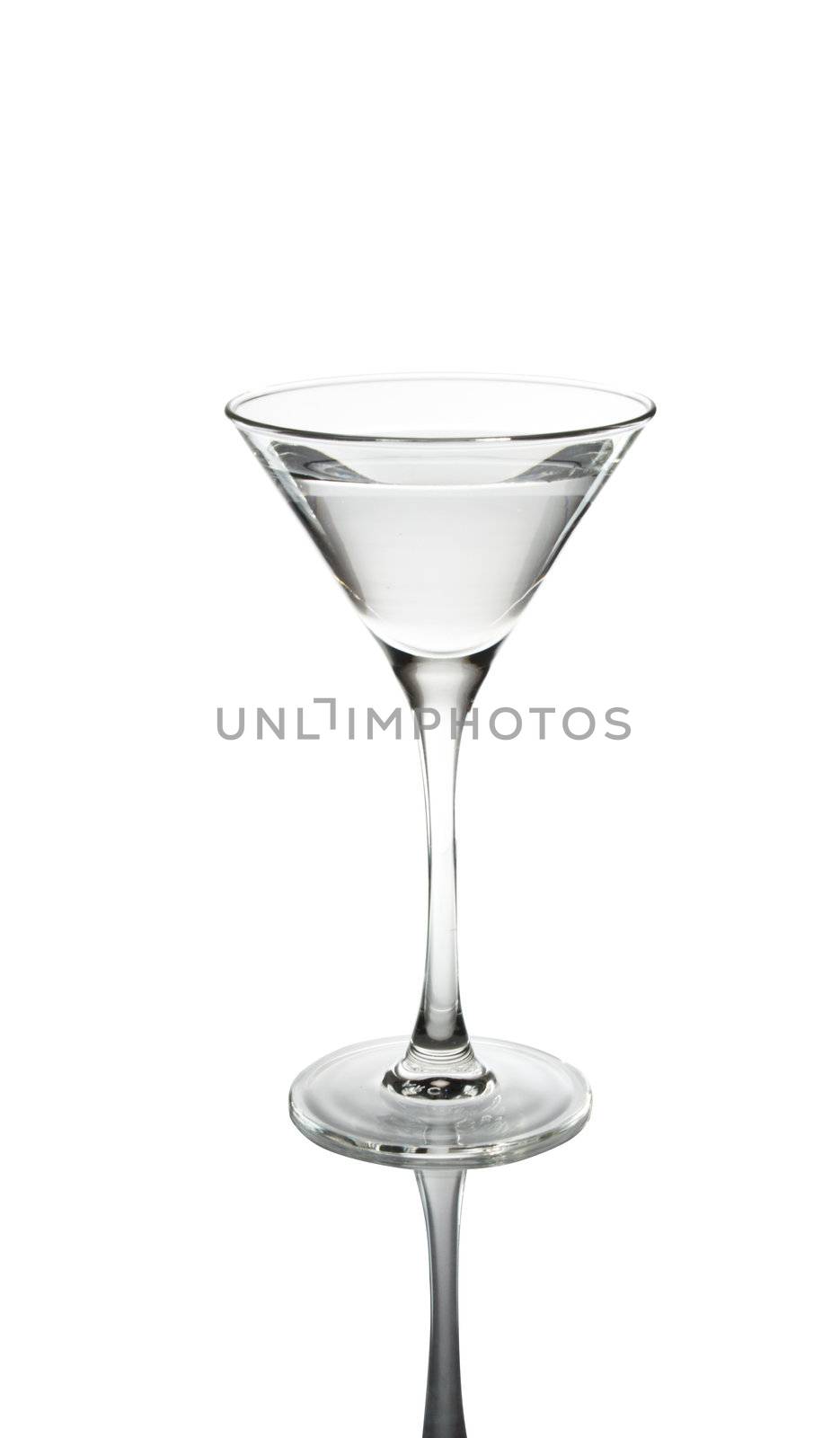 Glass of martini with reflexion on a white background
