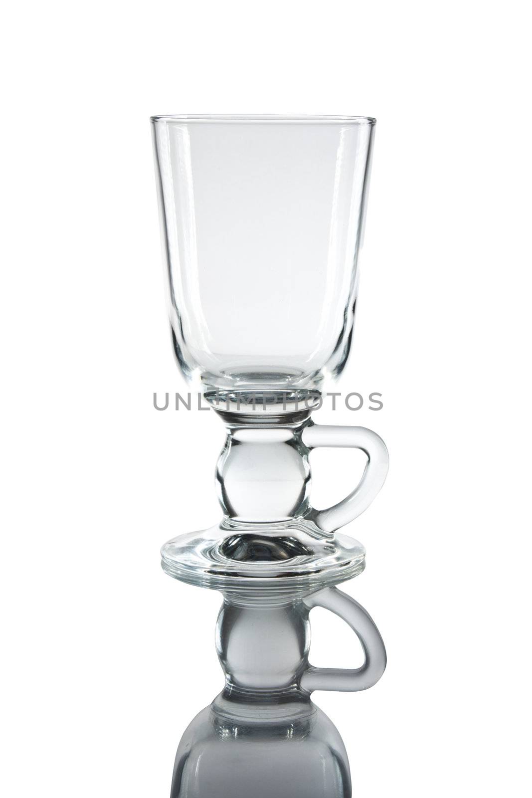 Glass of martini with reflexion on a white background.