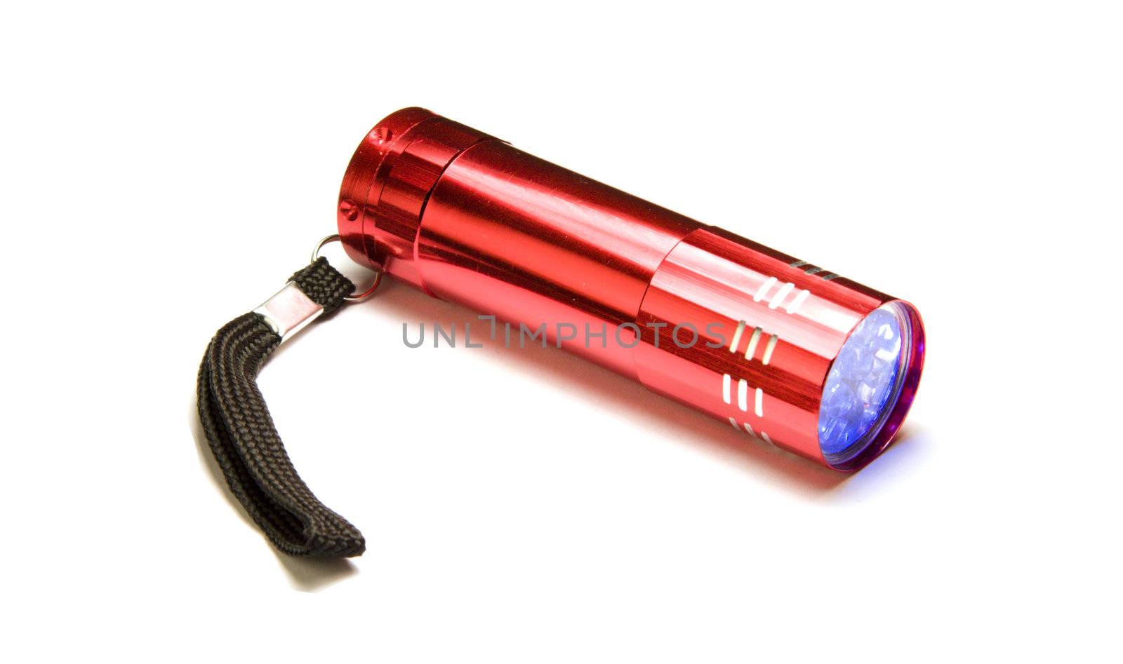 A small flashlight over white background