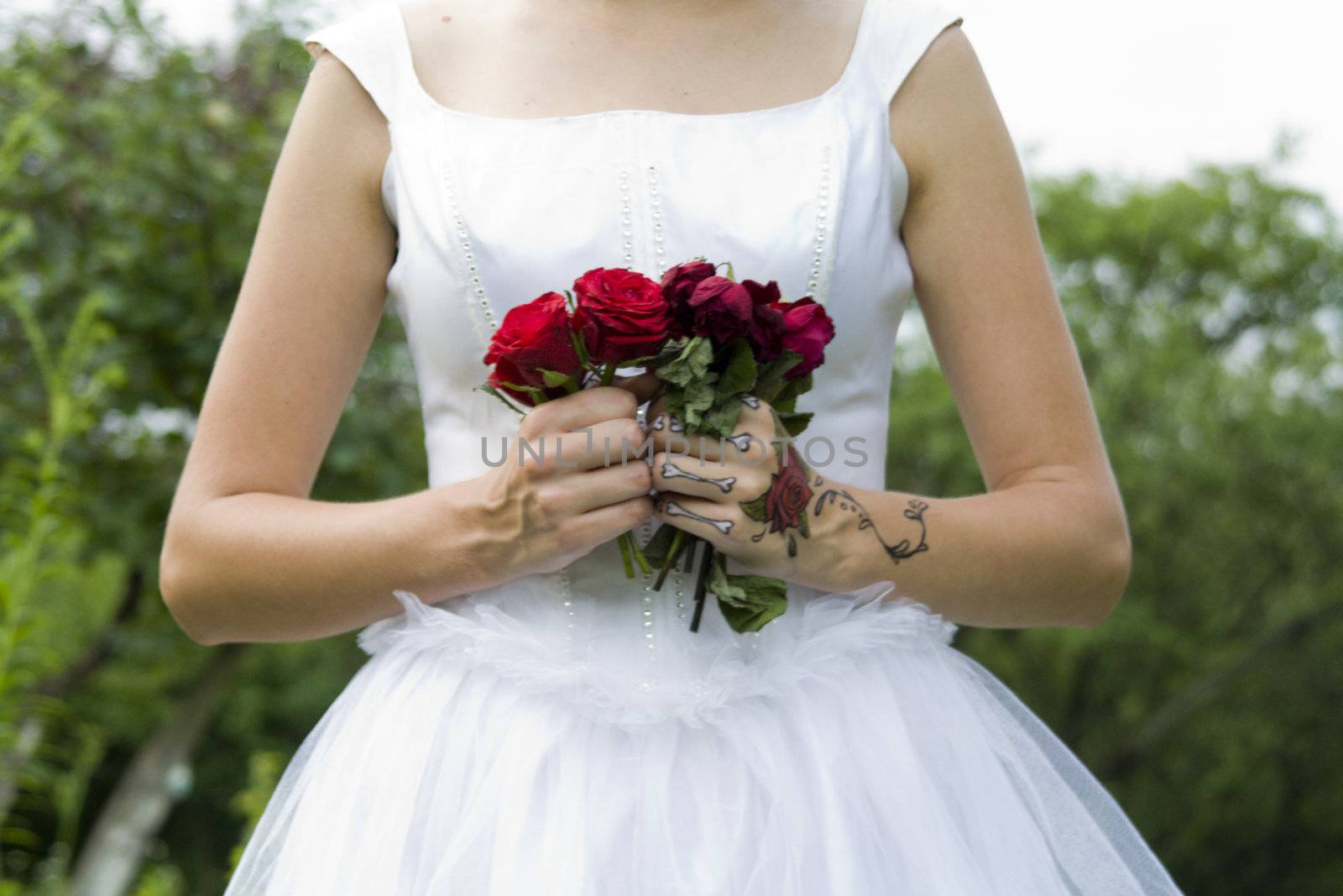 bride holding her wedding flowers