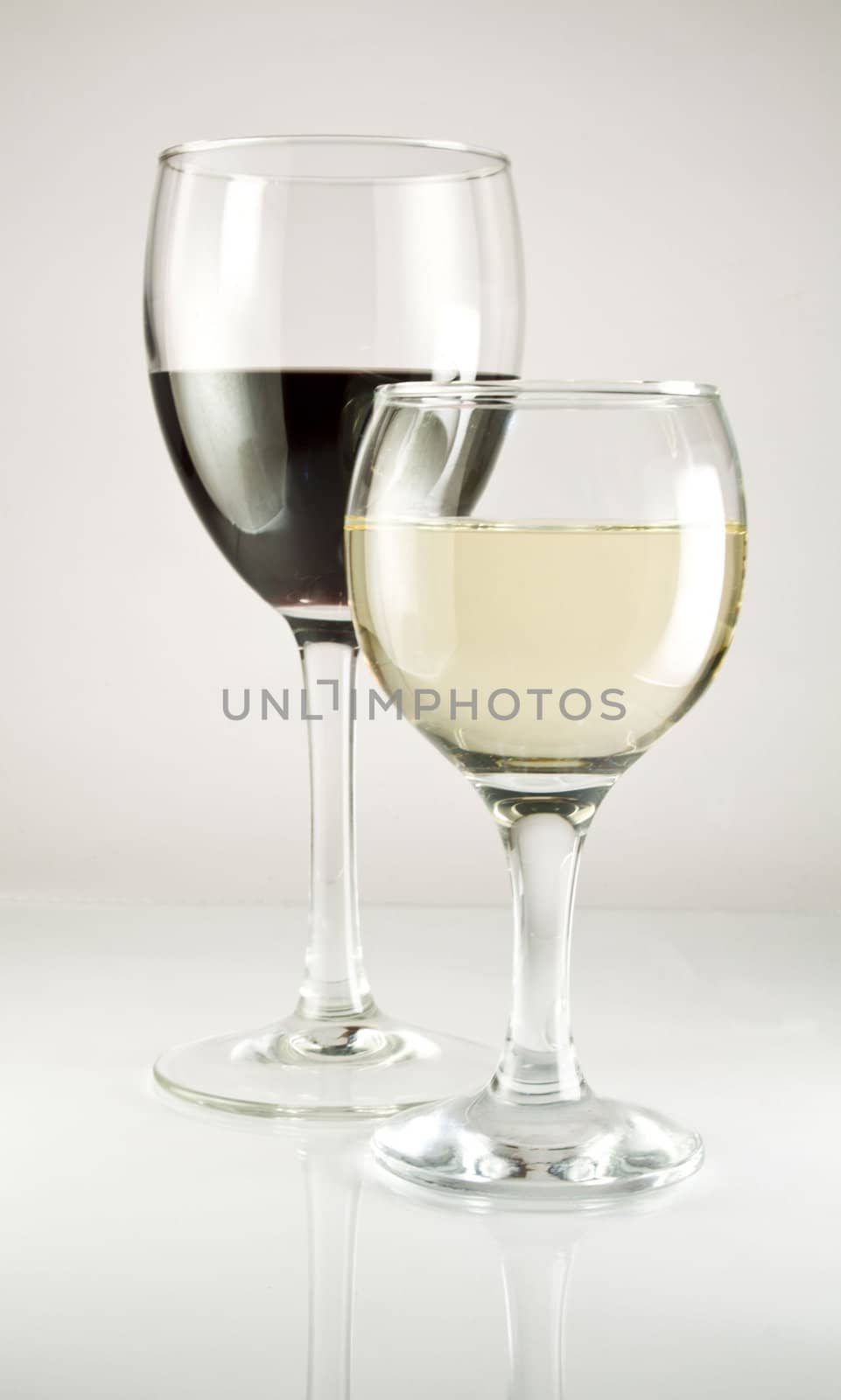 Red and White wine in two wineglass.