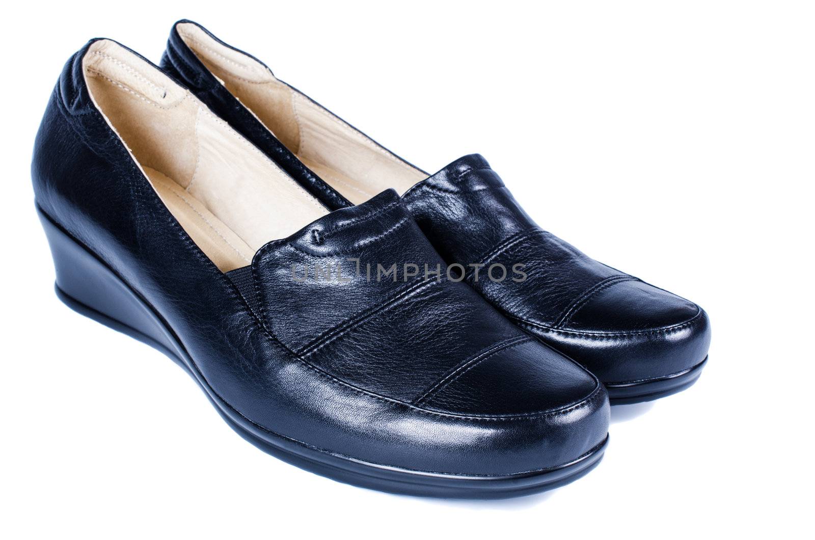 Pair of women black shoes isolared by Nanisimova