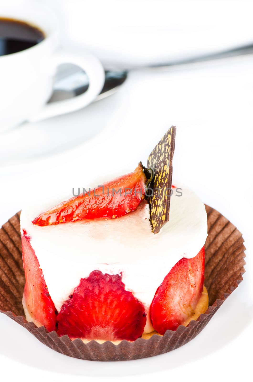 Strawberry cake on white coffee cup background