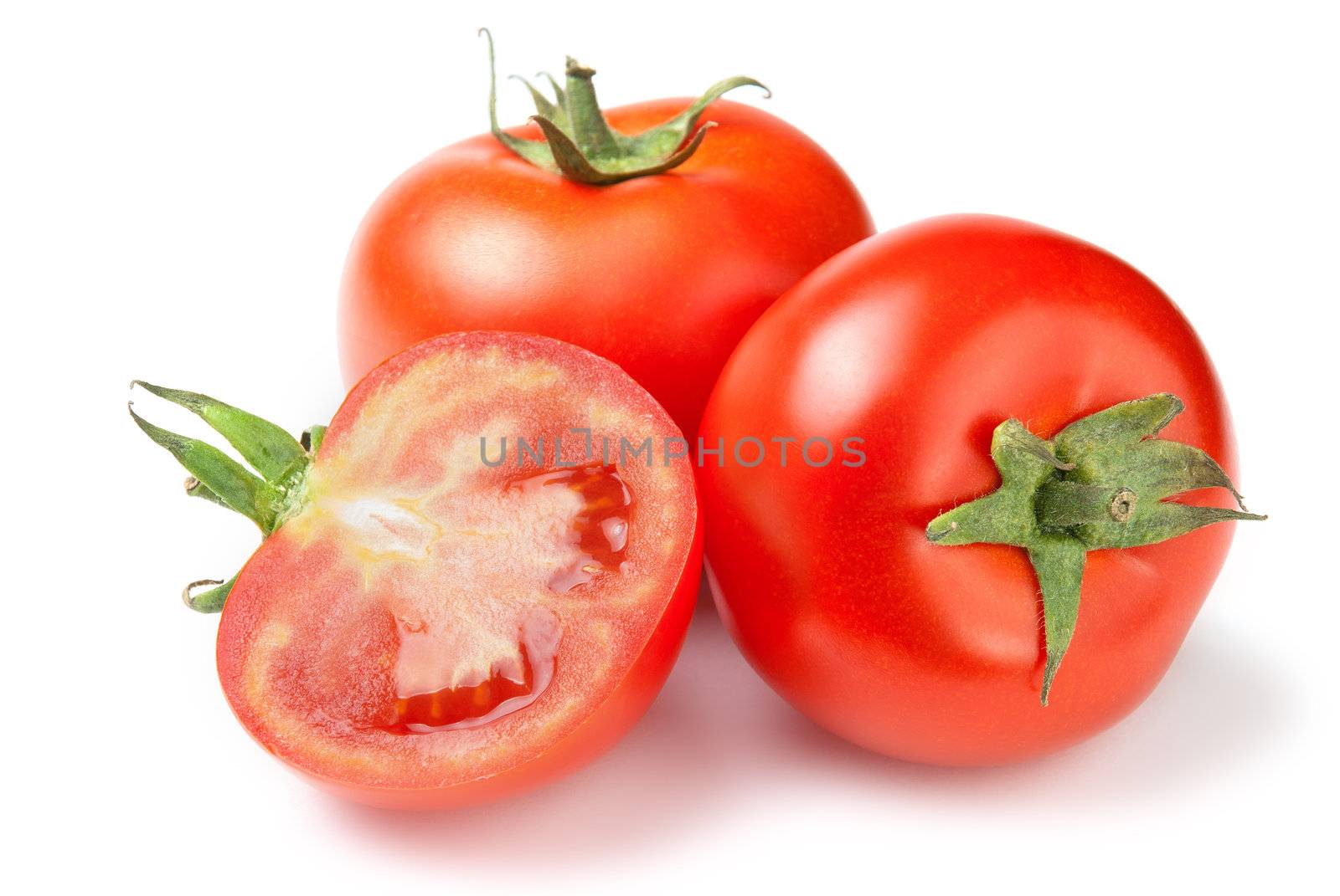 Fresh tomatoes on white background