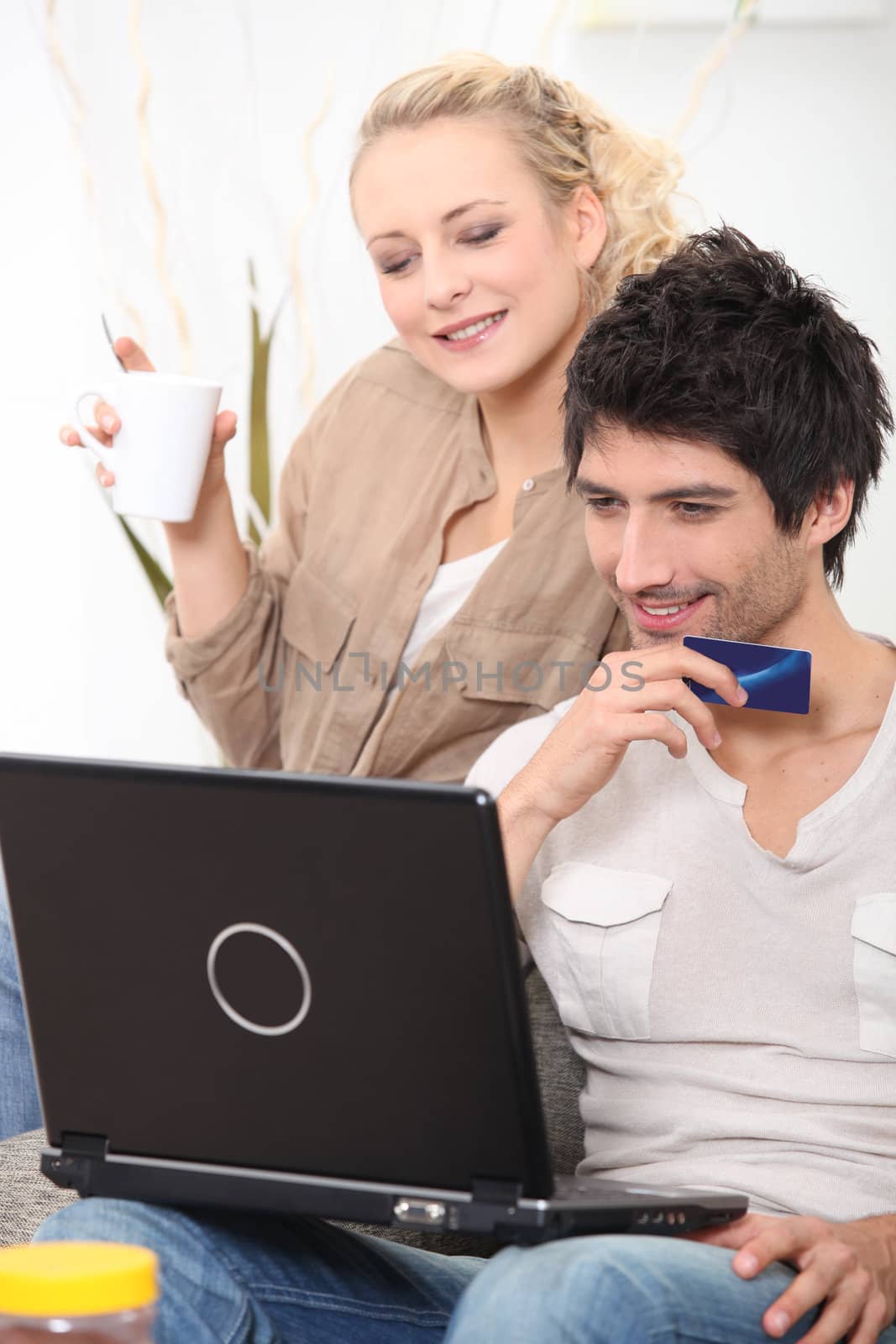 couple shopping on the Internet by phovoir