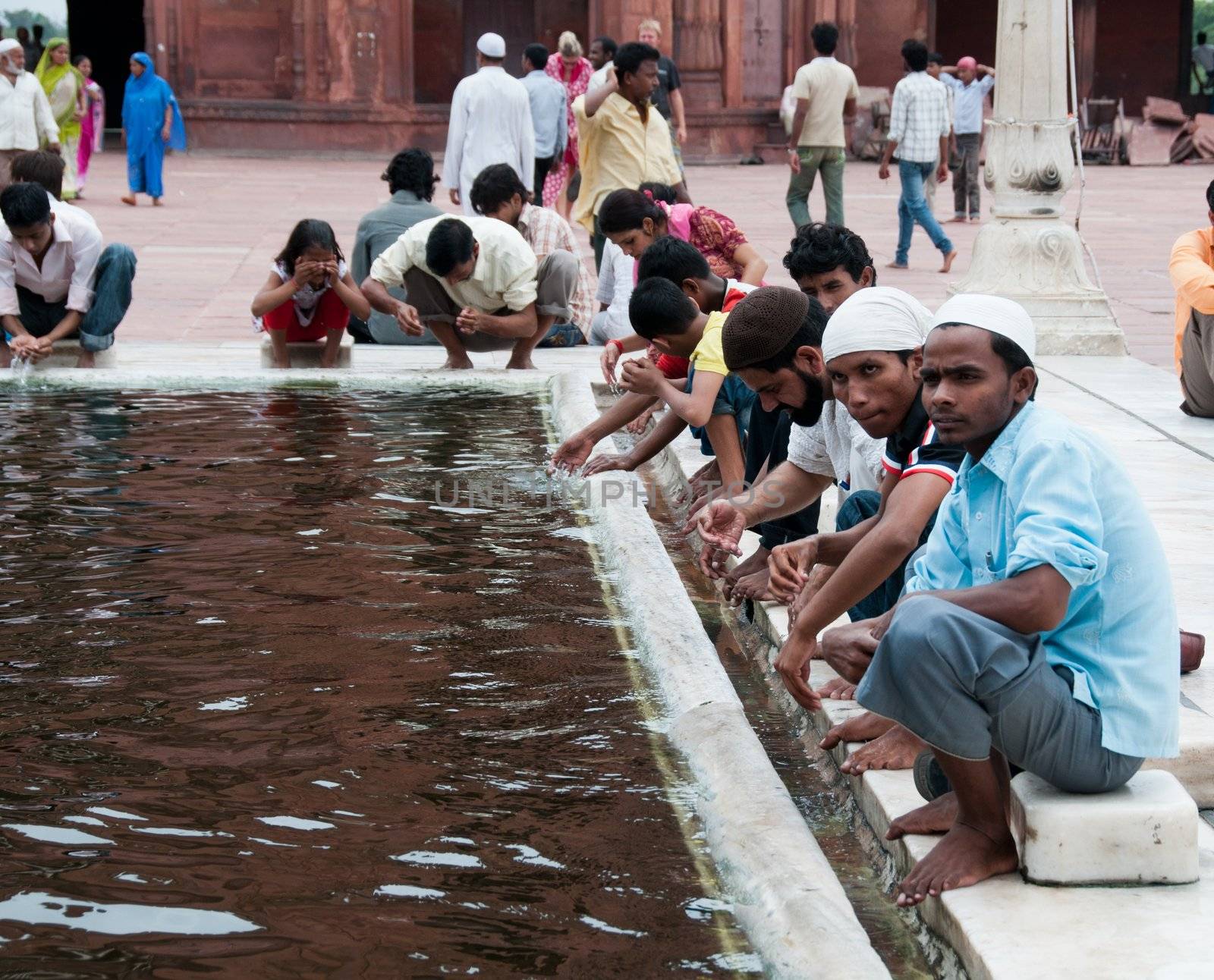 Ablution in Jama Masjid, India's largest mosque by iryna_rasko