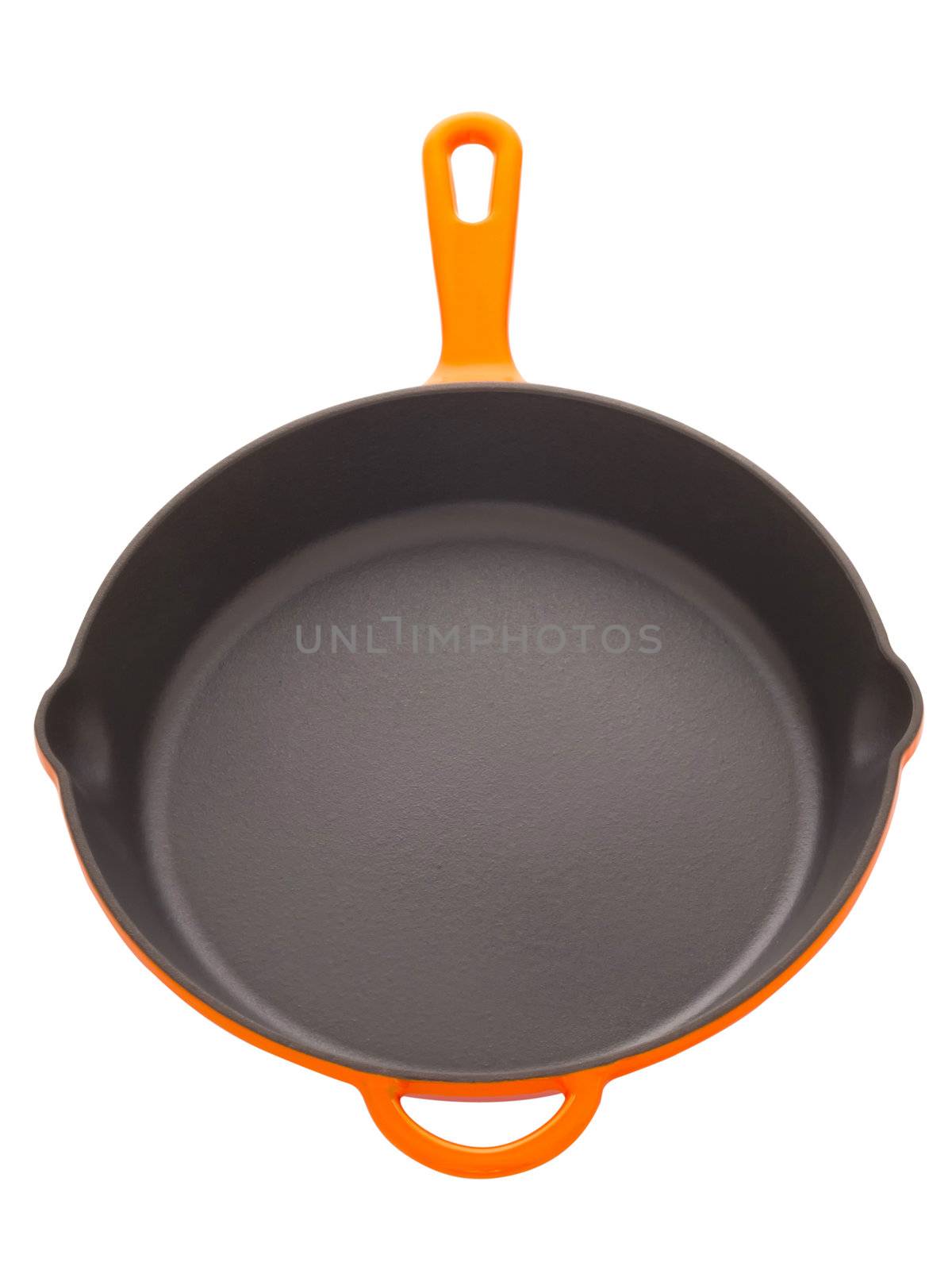 close up of a cast iron pan isolated on white