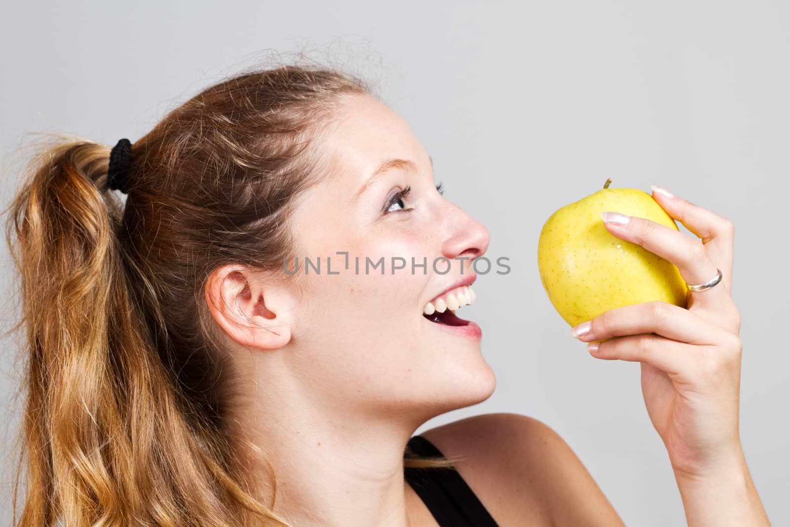 portrait of woman with apple by lsantilli