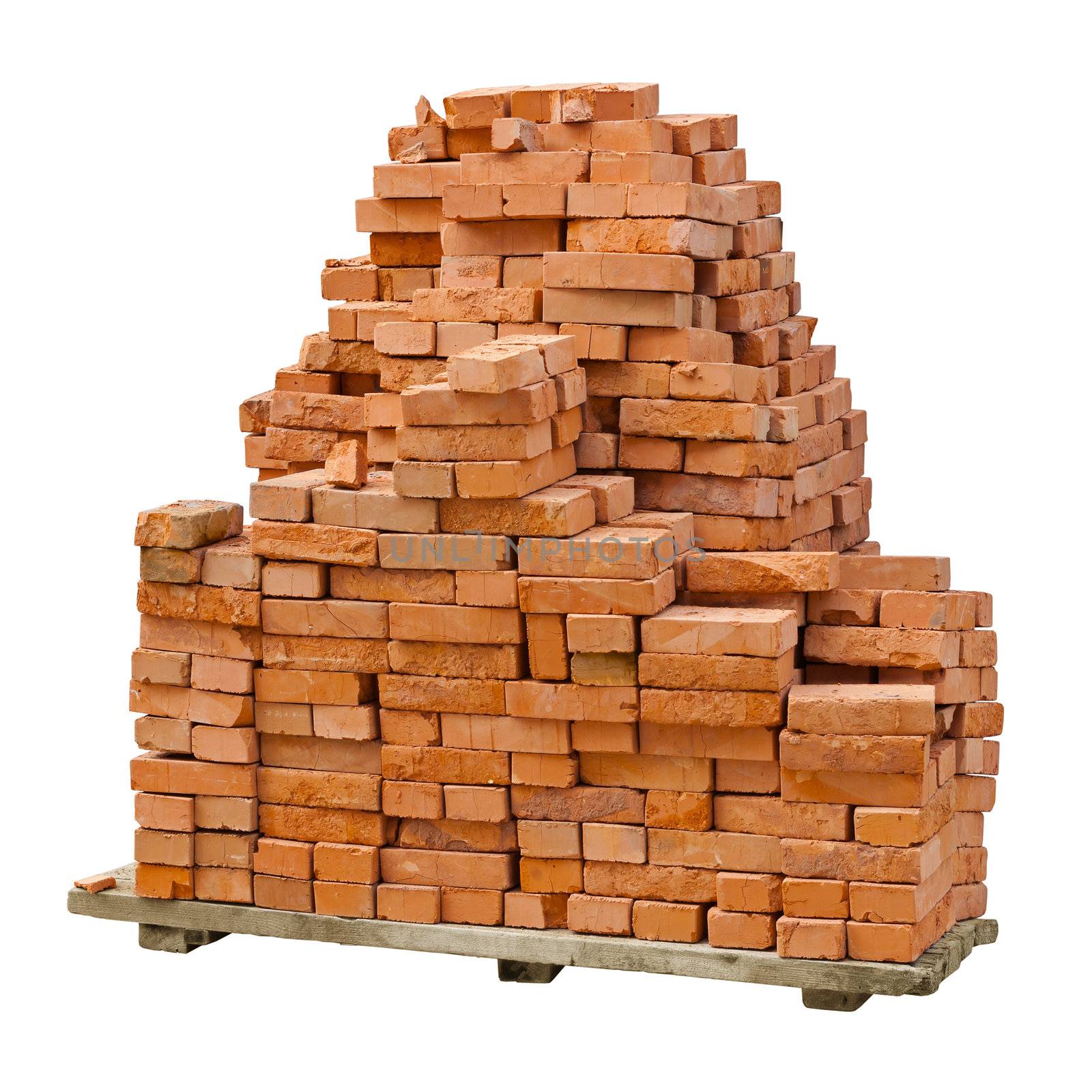 Stack of red clay bricks on white background by pzaxe