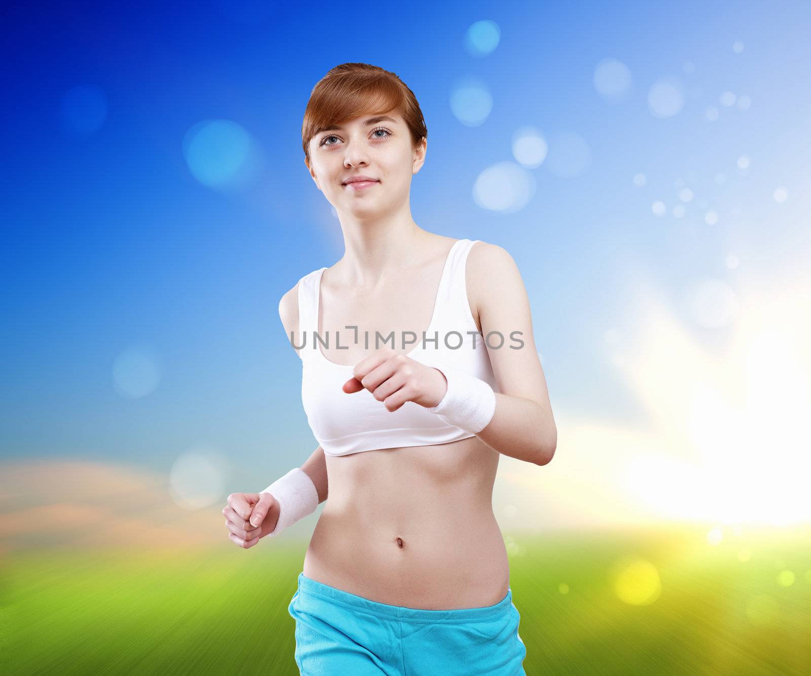 Portrait of a young woman doing sport by sergey_nivens