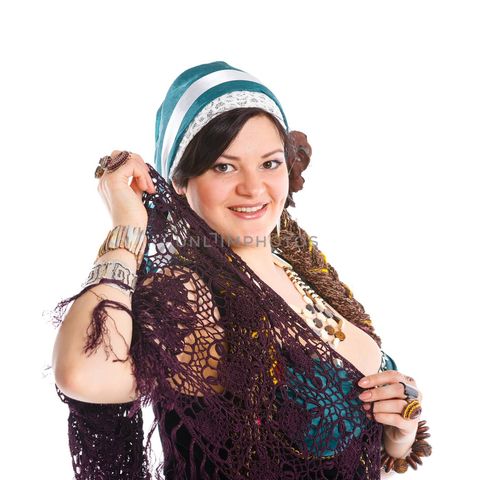 Portrait of oriental dancer in blue costume over white background
