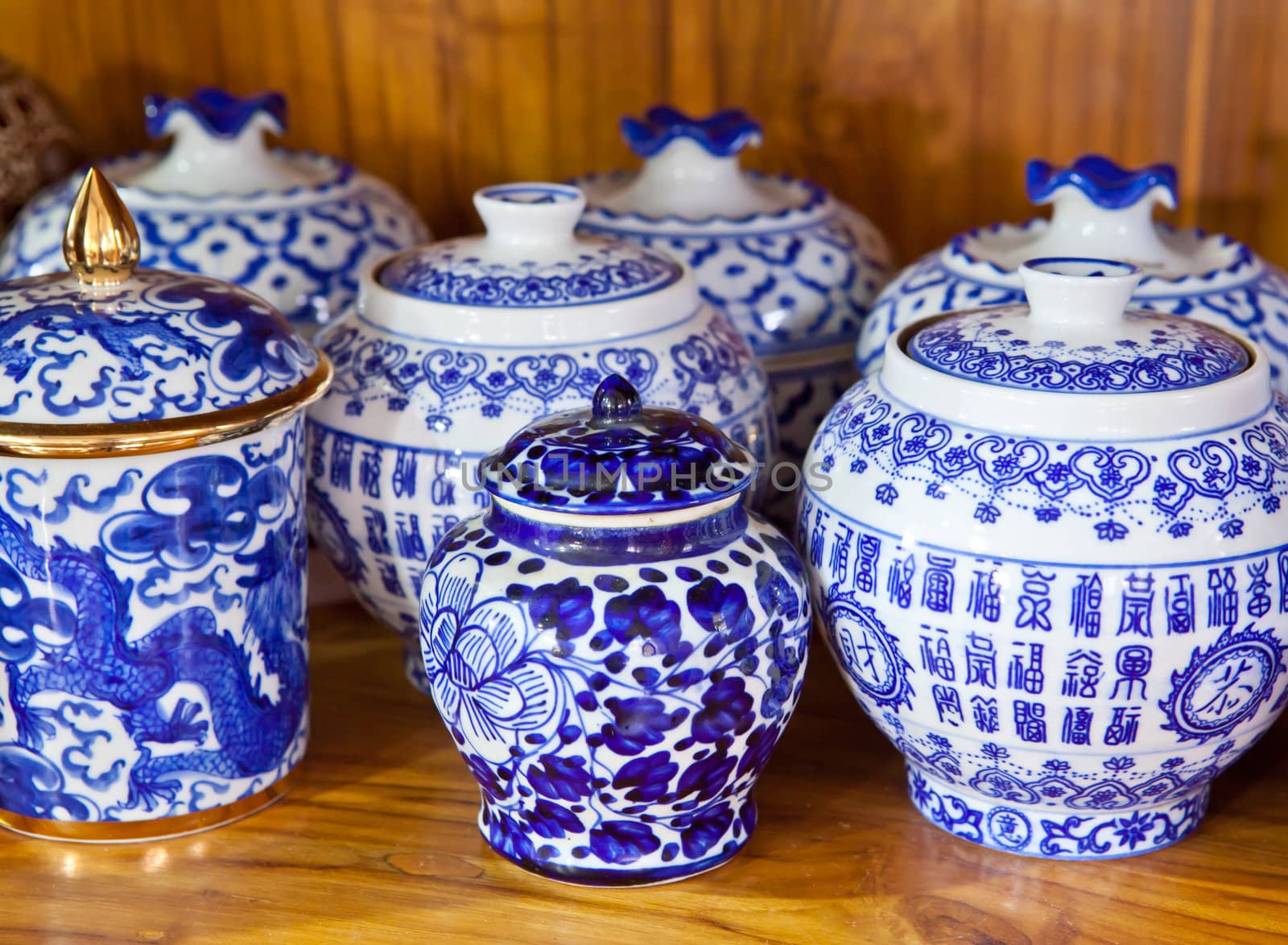 chinese antique vase on the wood background