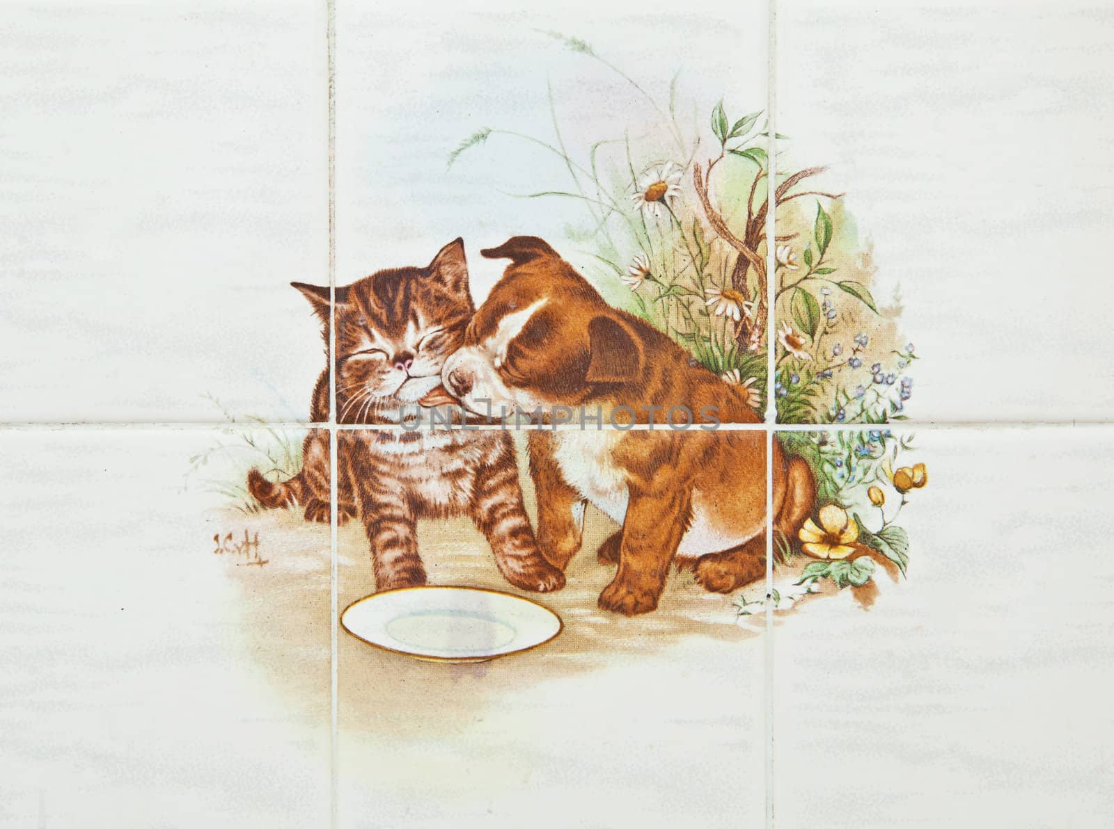 decorative tile with dog and cat design